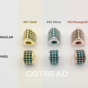 May include: A selection of gold, silver, and rose gold beads in triangular and wheel shapes. The beads are encrusted with small, dark green stones. The text on the image reads "#01 Gold", "#02 Silver", and "#03 Rosegold". The bottom of the image has the text "GOTBEAD BEAD FOR YOU".