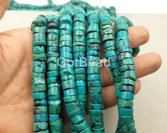 May include: A strand of turquoise beads, each bead is a cylinder with a flat top and bottom. The beads are a vibrant blue-green color with brown and black marbling.