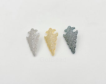 May include: Three silver, gold, and black metal pendants with a leaf-like design, each covered in small clear rhinestones.