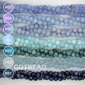 May include: Seven strands of round beads in various shades of blue, from dark blue to light blue, with numbers 01 through 07 labeled on the left side of the image.
