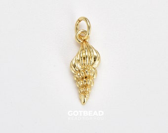 May include: Gold-toned seashell charm with a loop at the top for attaching to jewellery or other crafts.