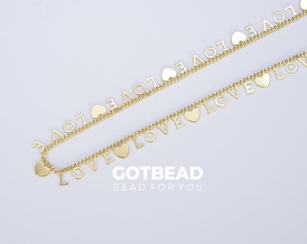 May include: Gold chain necklace with small heart charms and the word "LOVE" spelled out on each charm. The necklace is on a white background and the text "GOTBEAD BEAD FOR YOU" is below the necklace.