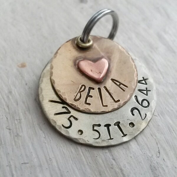 Small pet tag with a heart