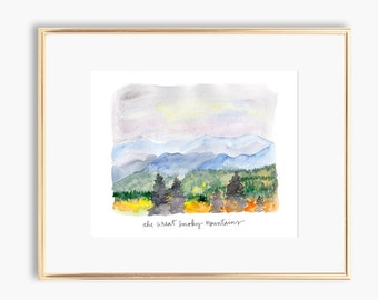May include: Watercolor painting of the Great Smoky Mountains with a blue, green, and yellow color scheme. The text "the great Smoky Mountains" is written in cursive at the bottom of the painting.