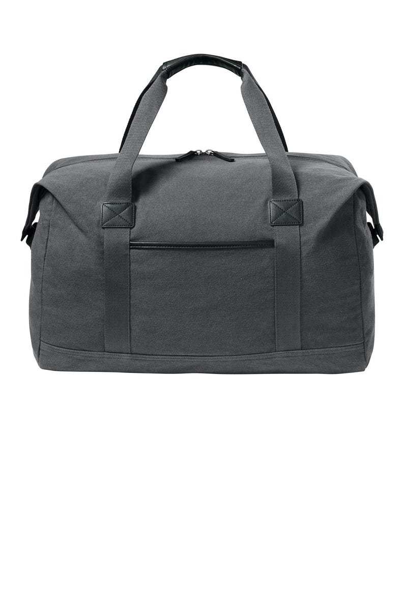 May include: A charcoal gray canvas duffel bag featuring a rectangular main compartment with a top zipper closure, two sturdy fabric handles with black leather-like grips, and a horizontal front pocket accented with a black trim detail.