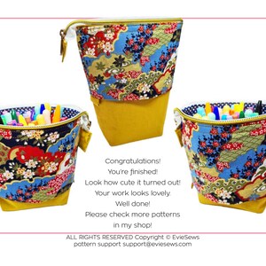 May include: Three yellow and blue fabric pencil cases with a zipper closure. The fabric has a floral and geometric pattern. The cases are filled with colored markers.