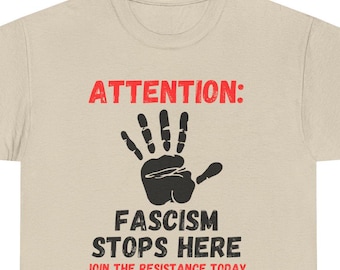 Camiseta unisex de algodón grueso con el lema "El fascismo se detiene aquí", dedicada al activismo político.