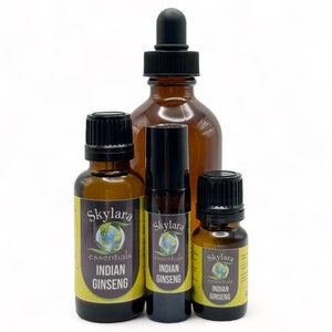 Peut inclure: Quatre flacons en verre brun avec des bouchons noirs et des &eacute;tiquettes. Les &eacute;tiquettes indiquent "Skylara essentials" et "Ginseng indien".
