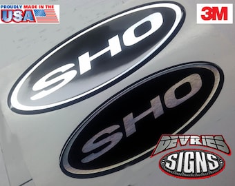 Gel Coated (DOMED) Ford Taurus "SHO" emblem overlay : Fits Taurus SHO 2010+.