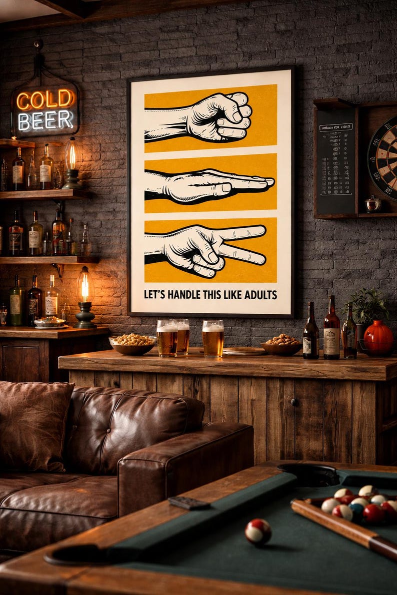 May include: A framed rectangular wall poster featuring three horizontal yellow panels, each displaying a black and white illustration of a hand gesture representing rock, paper, and scissors. Below the illustrations, the text reads LET'S HANDLE THIS LIKE ADULTS in a bold, black, sans-serif font.