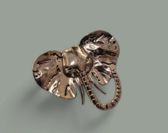 Gold metal elephant brooch