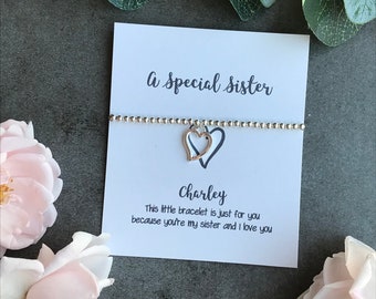 Pulsera con dijes, pulsera con dijes de cuentas, una hermana especial, hermana, dije de corazón, pulsera de plata, regalo para hermana, regalo para hermana