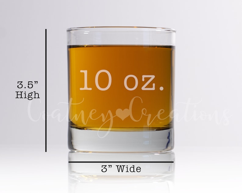 May include: A clear glass 10 ounce whiskey tumbler with a heart etched on the front. The tumbler is 3.5 inches high and 3 inches wide.