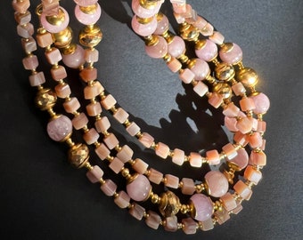 Set di collana di perline rosa e oro con chiusure magnetiche
