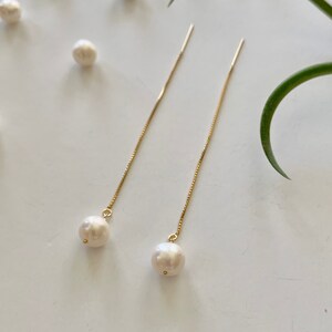 Pendientes de perla rellenos de oro de 14 k