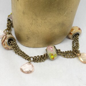 4 Glass beads on multiple chains 8 1/4” Bracelet w/ sparkly accents