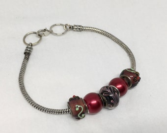 5 Glass beads on Pandora style silvertone 8 1/2” bracelet