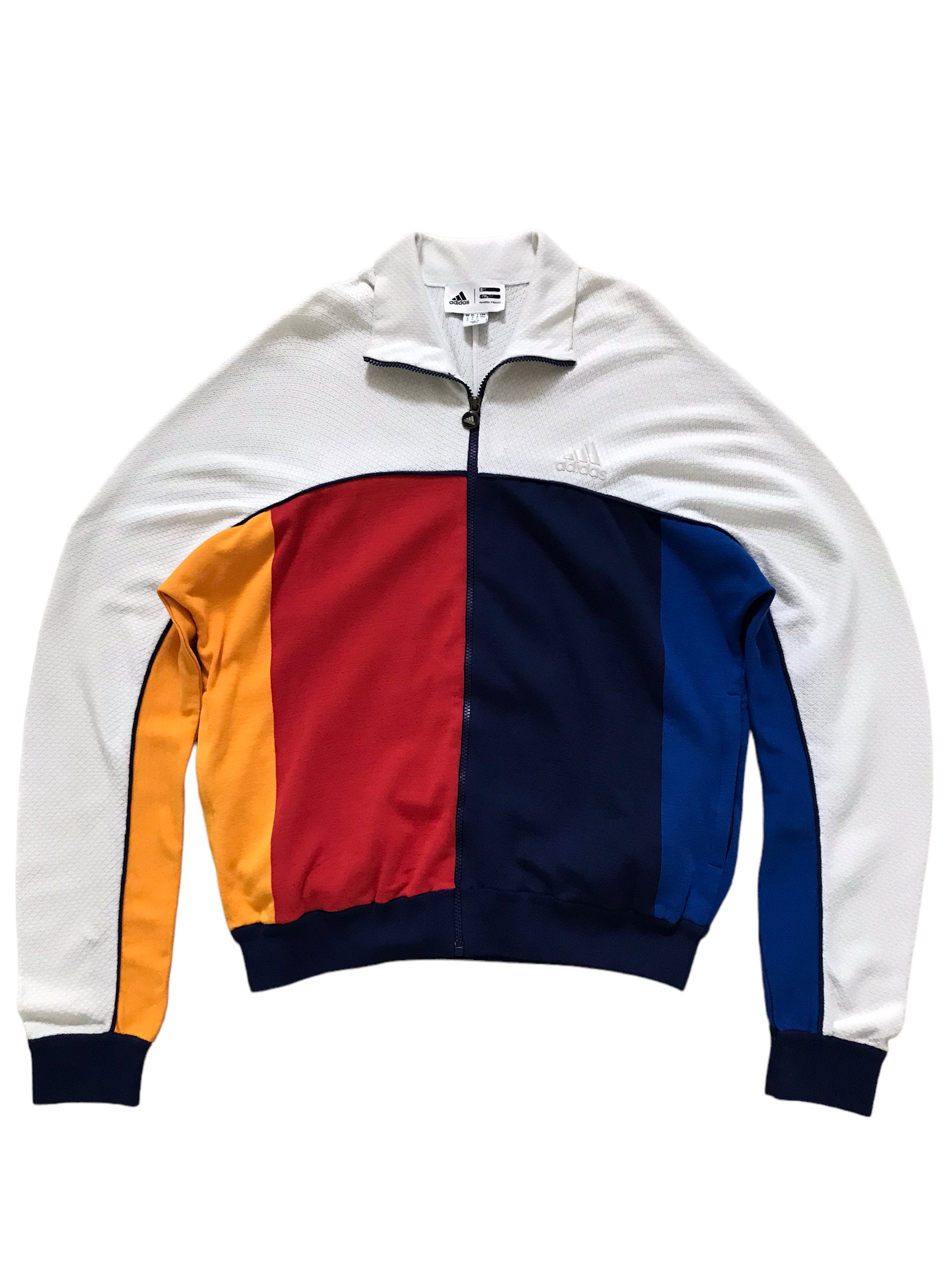 Track top adidas pharrell cheap williams