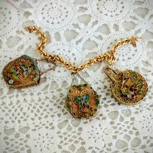 Charm Bracelet Vintage Chinese Cloisonne Charms attached to a Monet Gold Link Bracelet