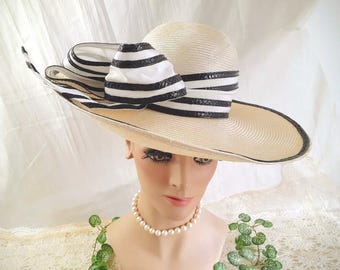 Sombrero Derby de paja vintage de Jack McConnell: ala ancha color marfil con cinta blanca y negra
