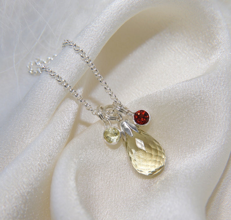 Necklace with pendant Lemonquartz Faceted Briolett and Garnet Diamond Schlif in silver frame