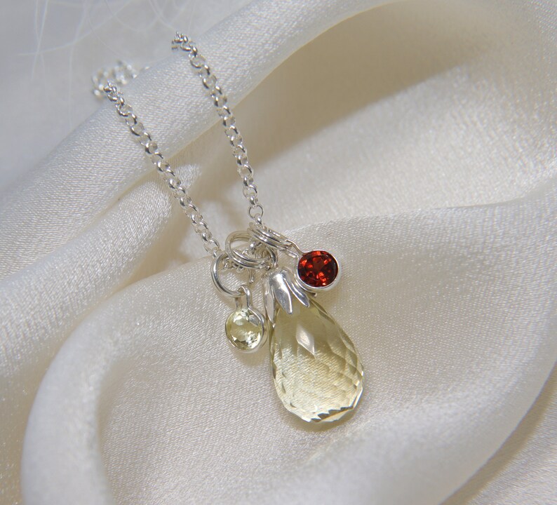 Necklace with pendant Lemonquartz Faceted Briolett and Garnet Diamond Schlif in silver frame