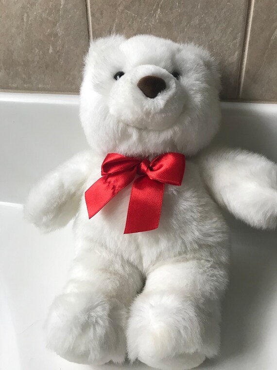 teddy bear with red bow