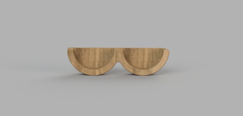 May include: A wooden stand with two half-circle shaped compartments. The stand is made of light brown wood and has a smooth finish.