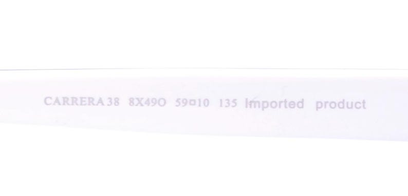 Puede incluir: Primer plano del interior de un marco blanco con el texto "CARRERA 38 8X490 59010 135 Imported product" impreso en negro.