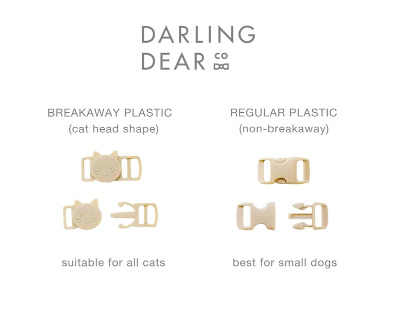 May include: Beige plastic breakaway and regular buckles for pet collars. The breakaway buckle is cat-shaped and suitable for all cats. The regular buckle is best for small dogs. The text "DARLING DEAR CO" is at the top.