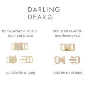 May include: Beige plastic breakaway and regular buckles for pet collars. The breakaway buckle is cat-shaped and suitable for all cats. The regular buckle is best for small dogs. The text "DARLING DEAR CO" is at the top.