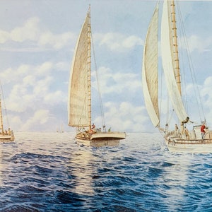May include: Three white sailboats with brown masts and sails are sailing on a blue ocean with white clouds in the sky.