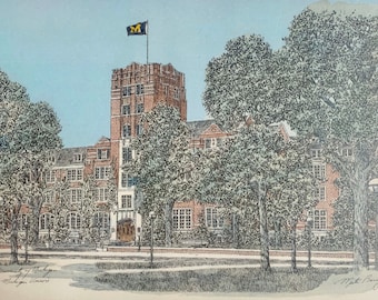 May include: A black and white drawing of a brick building with a tall tower. The building has a flagpole with a yellow flag with a blue 'M' on it. The building is surrounded by trees. The text 'University of Michigan, Michigan Union' is written at the bottom of the drawing.