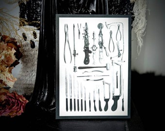 May include: A black and white illustration of a collection of vintage medical tools, including scalpels, forceps, and a hammer.