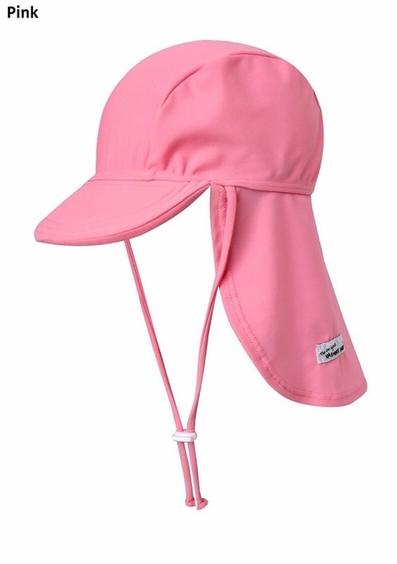 May include: Pink sun hat with a long flap that can be tied at the back of the neck. The hat has a small brim and a white label that says "The Original  VENT  ME"