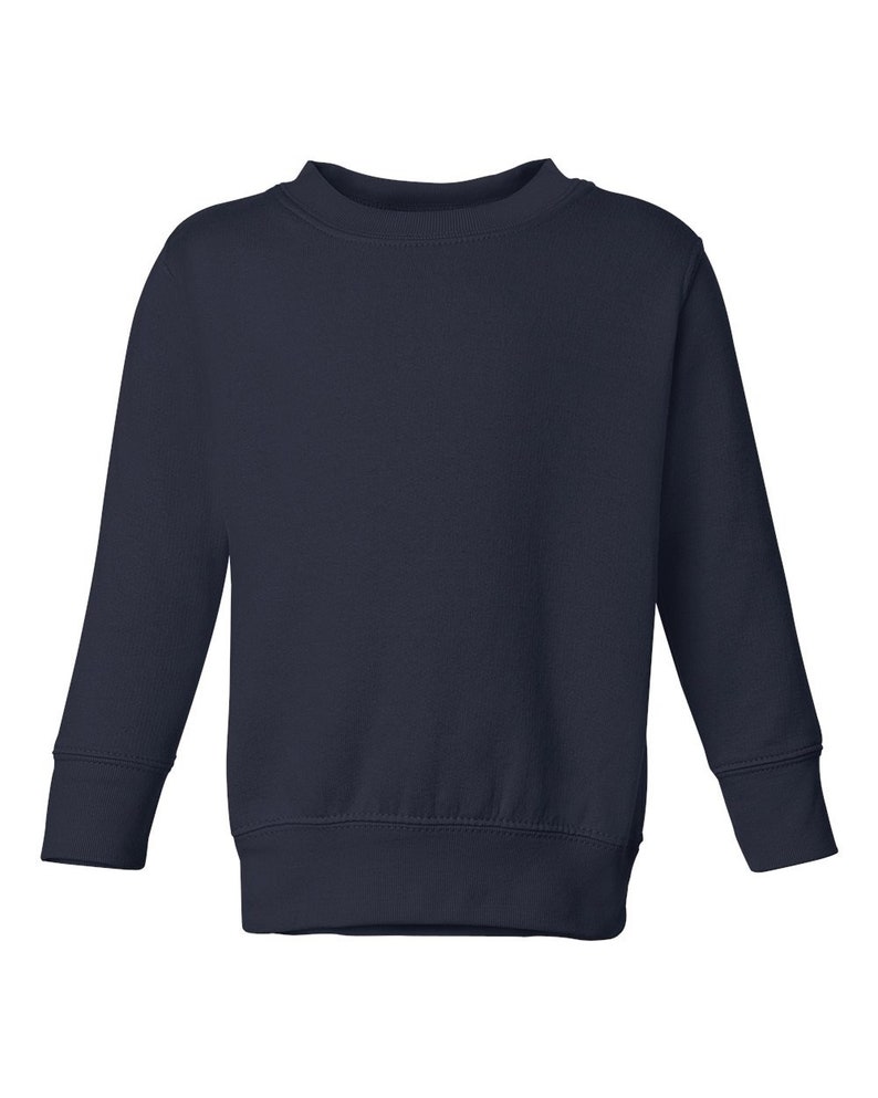 May include: A navy blue long-sleeved sweatshirt with a crew neck.