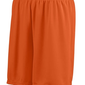 May include: Orange athletic shorts made of a lightweight, breathable fabric. The shorts have an elastic waistband and a relaxed fit.