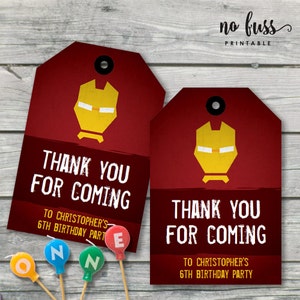 May include: Two red and yellow Iron Man themed thank you tags with the text "Thank you for coming" and "To Christopher's 6th Birthday Party".