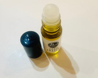 Pickle's "Scar Eraser" roller ball. Vitamin E, vitamin C, vitamin A, helichrysum, beta carotene, marula and tamanu oil