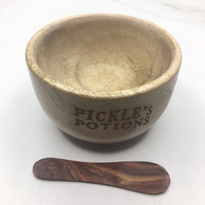 Handcrafted wooden mask bowl with carved wood spoon