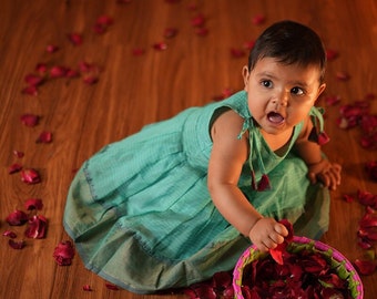 Sleeveless blue infant pleated dress in handwoven cotton silk with tieup | Annaprashan outfit | Vishu and Onam Traditional Baby girl froc