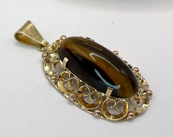 Colgante antiguo de ojo de tigre en oro de 9 quilates: amuleto Art Déco de filigrana alemana