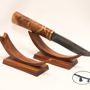 The oleaster wood knife stand. Knife display. Collectible knife holder. A display stand for collectible or gift knives.