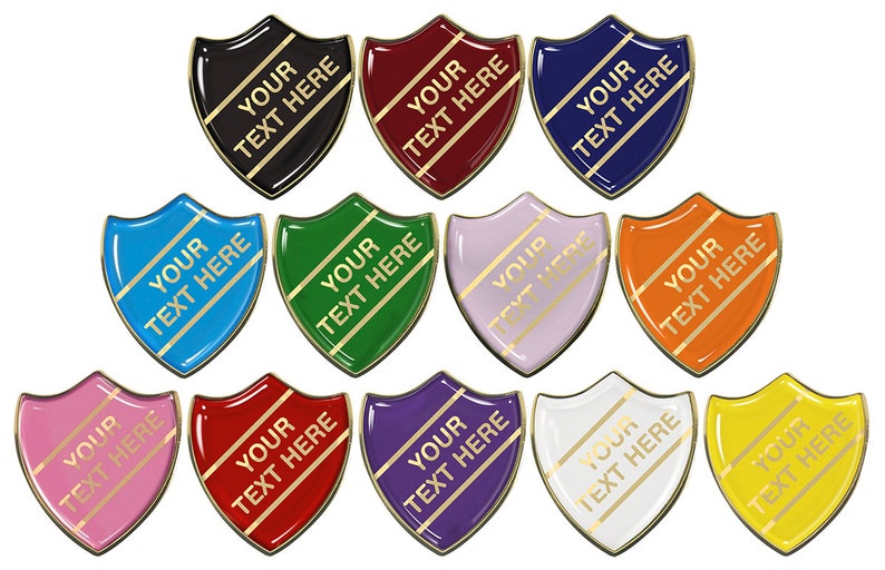 May include: Twelve shield-shaped badges in various colors with gold trim. Each badge has the text "YOUR TEXT HERE" printed on it.