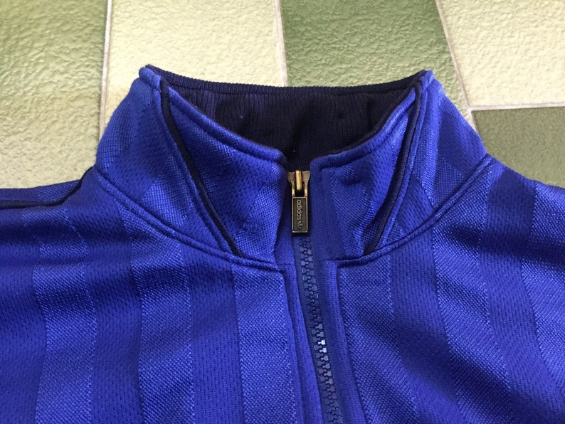 blue and gold adidas tracksuit