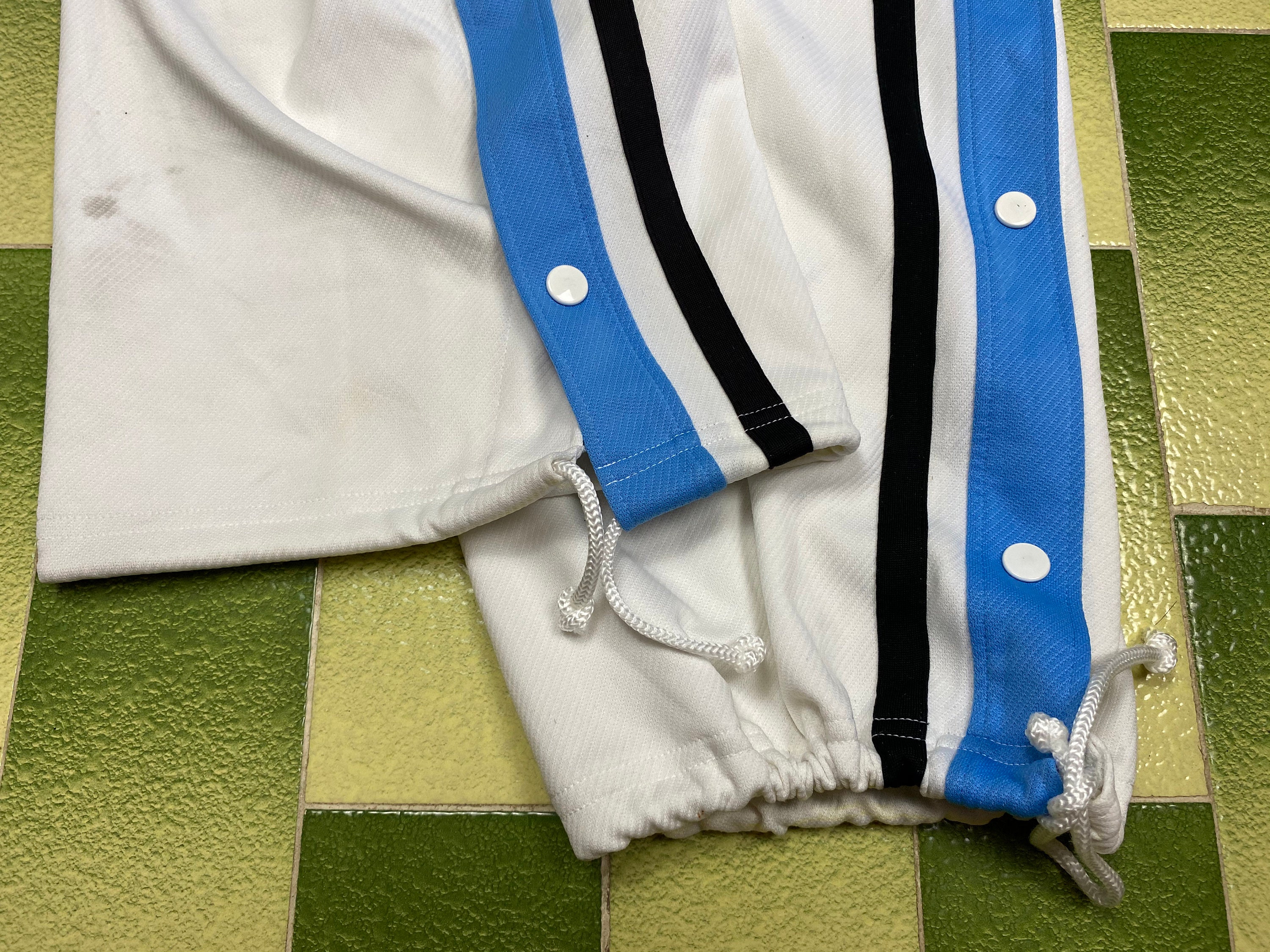 nike snap button pants