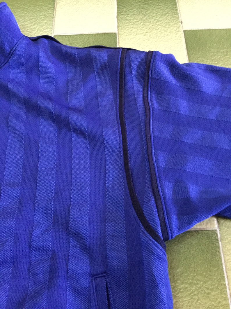 purple and gold adidas tracksuit
