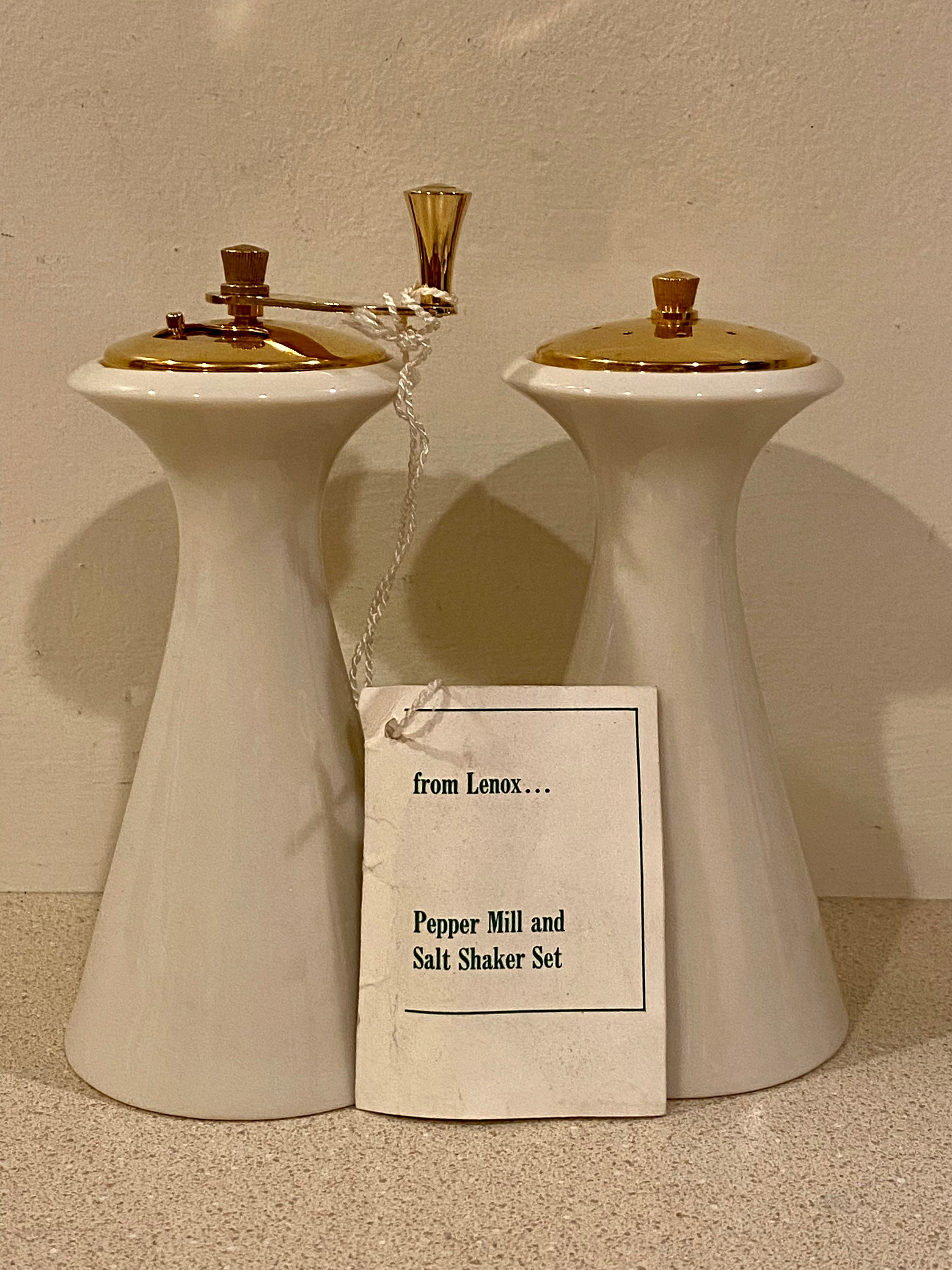 Longaberger pottery woven salt & pepper shakers (paprika color) with metal  caddy - Salt & Pepper Shakers, Facebook Marketplace
