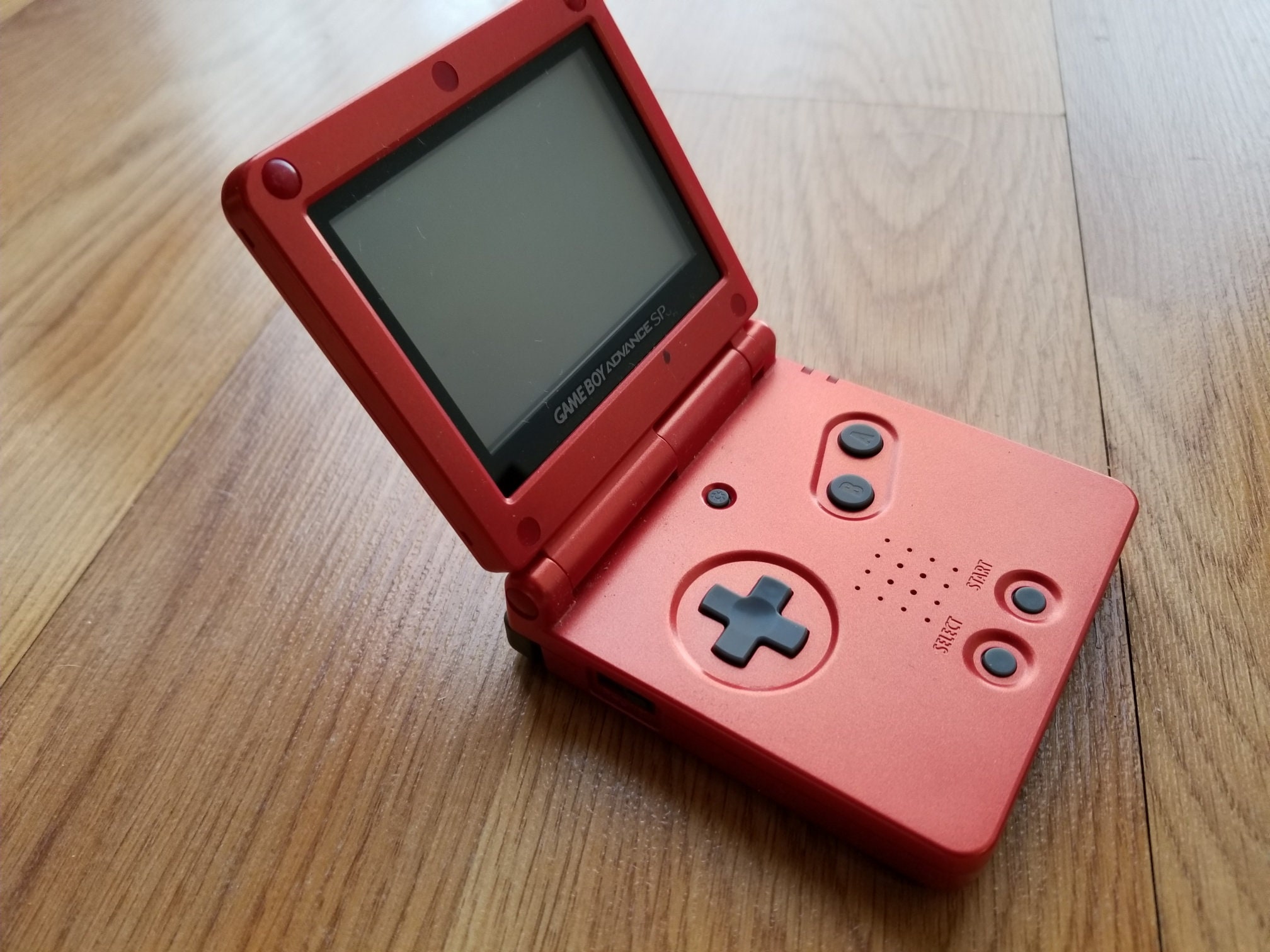 Nintendo Game Boy Advance SP in Flame Red
