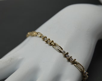 7 1/8" 10K Gold with Diamonds Thin Bracelet